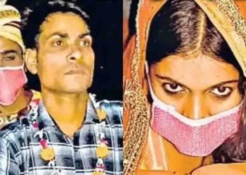 बिना बैंड-बाजा और बारात की हो रही शादी,  दूल्हा-दुल्हन ने मास्क पहन कर डाल रहे वरमाला