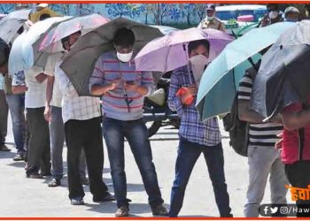 बनिये का दिमाग : कोरोना संक्रमण से बचाव के लिये छाते का किया अद्भुत प्रयोग